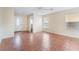 Bright and airy living room featuring tile floors, neutral walls, and a ceiling fan for added comfort at 1152 Gecko Rd, Henderson, NV 89002