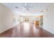 Spacious living room offering ample natural light, tile floors, and an open layout connecting to the kitchen at 1152 Gecko Rd, Henderson, NV 89002