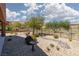 Backyard with desert landscaping, bird bath, and desert views at 1407 Wheelwright Ct, Mesquite, NV 89034