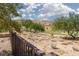 Scenic golf course view with desert landscaping, trees, and a clear blue sky at 1407 Wheelwright Ct, Mesquite, NV 89034