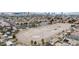 Expansive aerial view showcasing horse property with multiple riding arenas in a residential neighborhood, near downtown at 1462 Rawhide St, Las Vegas, NV 89119