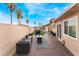 Outdoor living featuring a patio, fire pit, seating area, and a grill, perfect for entertaining at 1462 Rawhide St, Las Vegas, NV 89119