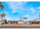 Charming single-story home with solar panels, desert landscaping, and brick fence in a sunny location at 1462 Rawhide St, Las Vegas, NV 89119