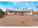 Charming single-story home with a low-maintenance desert landscape and a solar panel installation at 1462 Rawhide St, Las Vegas, NV 89119