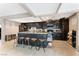 Kitchen featuring a center island with dark cabinets, granite countertops, and stainless steel appliances at 1462 Rawhide St, Las Vegas, NV 89119