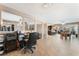 Open-concept living room with tile flooring, neutral paint, and views to the kitchen and dining areas at 1462 Rawhide St, Las Vegas, NV 89119