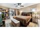 Main bedroom boasts a luxury rug, furniture and decor, and a walk-out to another room in the home at 1462 Rawhide St, Las Vegas, NV 89119