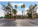 Well-maintained community building with lush landscaping, ample parking, and a welcoming entrance at 1560 Jamielinn Ln # 101, Las Vegas, NV 89110