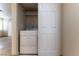 Convenient laundry closet with stacked washer and dryer unit for easy access at 1560 Jamielinn Ln # 101, Las Vegas, NV 89110