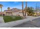 Attractive single-Gathering home with a manicured front yard, drought-tolerant landscaping and a three-car garage at 1903 Ginger Blossom Ave, North Las Vegas, NV 89031