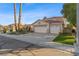 Charming single-Gathering home with a three-car garage and a well-maintained front yard at 1903 Ginger Blossom Ave, North Las Vegas, NV 89031