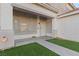 Covered porch with low-water landscaping at 1903 Ginger Blossom Ave, North Las Vegas, NV 89031