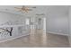 Open loft space features tiled flooring, decorative wall art, and lots of natural light at 1903 Ginger Blossom Ave, North Las Vegas, NV 89031