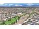 Expansive aerial view of the residential community, showing the layout, landscaping, and surrounding landscape at 1909 Mountain Hills Ct # 103, Las Vegas, NV 89128