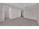 Bedroom featuring neutral carpet, ceiling fan, and closet at 1909 Mountain Hills Ct # 103, Las Vegas, NV 89128