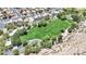 Lush community park featuring a circular walkway and mature trees for residents to enjoy outdoor activities at 1909 Mountain Hills Ct # 103, Las Vegas, NV 89128