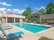 Sparkling community pool with plenty of lounge seating for residents to relax and enjoy the sun at 1909 Mountain Hills Ct # 103, Las Vegas, NV 89128