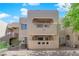 View of condo building featuring private balconies and neutral exterior paint at 1909 Mountain Hills Ct # 103, Las Vegas, NV 89128