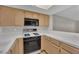Kitchen with white counters and standard appliances at 1909 Mountain Hills Ct # 103, Las Vegas, NV 89128