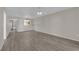 Spacious living room featuring wood-style flooring and a ceiling fan at 1909 Mountain Hills Ct # 103, Las Vegas, NV 89128