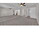 Large bedroom with wall-to-wall mirrors and plush carpeting at 1909 Mountain Hills Ct # 103, Las Vegas, NV 89128