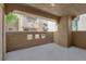 View of the outdoor patio space with concrete flooring and view of the building at 1909 Mountain Hills Ct # 103, Las Vegas, NV 89128