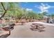 A picturesque picnic area offering barbecue grills and plenty of seating for outdoor gatherings and community fun at 1909 Mountain Hills Ct # 103, Las Vegas, NV 89128