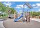 Community playground with a slide and climbing structure offering a safe and fun area for children to play and explore at 1909 Mountain Hills Ct # 103, Las Vegas, NV 89128