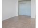 A bedroom with tile floor and closet; simple yet functional at 2251 Wigwam Pkwy # 314, Henderson, NV 89074