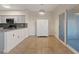 Bright dining area with tiled floors, chandelier, and access to a private balcony at 2251 Wigwam Pkwy # 314, Henderson, NV 89074