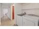 Laundry room with washer, dryer, and additional storage space at 2251 Wigwam Pkwy # 314, Henderson, NV 89074