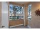 Covered patio features columns, with a decorative wall emblem at 2251 Wigwam Pkwy # 314, Henderson, NV 89074