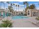 Community pool with ample seating and well-manicured landscaping at 2251 Wigwam Pkwy # 314, Henderson, NV 89074