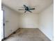 Bedroom featuring carpet floors and sliding glass doors leading to outdoor patio at 230 Sundance Shores Dr, Laughlin, NV 89029