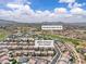 Stunning aerial view of 2833 Athena Hill Court, nestled near the Rio Secco Golf Club, surrounded by lush landscapes and mountain views at 2833 Athena Hill Ct, Henderson, NV 89052