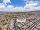 Scenic aerial view of a Primary-planned community with lush landscaping and single-Gathering homes at 2833 Athena Hill Ct, Henderson, NV 89052