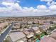 Expansive aerial shot capturing the vastness of the neighborhood, with homes and green spaces extending to the horizon at 2833 Athena Hill Ct, Henderson, NV 89052