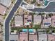 Overhead view features homes with pools and landscaping on Athena Hill Court at 2833 Athena Hill Ct, Henderson, NV 89052