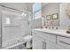 Bright bathroom with a glass-enclosed shower, white cabinets, and modern fixtures at 2833 Athena Hill Ct, Henderson, NV 89052