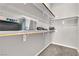 Walk-in closet with built-in shelving and ample storage space at 2833 Athena Hill Ct, Henderson, NV 89052