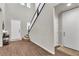 Entry foyer with high ceilings, hardwood floors, and a staircase leading to the upper level at 2833 Athena Hill Ct, Henderson, NV 89052