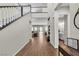 Elegant foyer with high ceilings, wood floors, and an open view to the living spaces at 2833 Athena Hill Ct, Henderson, NV 89052
