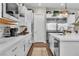 Clean, well-lit kitchen features a stainless steel refrigerator, ample counter space, and modern appliances at 2833 Athena Hill Ct, Henderson, NV 89052