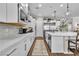 Contemporary kitchen featuring white cabinets, a center island, and stainless steel appliances at 2833 Athena Hill Ct, Henderson, NV 89052