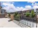 Spacious outdoor patio featuring decorative railing and view of neighboring homes at 2833 Athena Hill Ct, Henderson, NV 89052