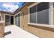 Covered patio with an exterior view of the home and access to the interior at 2833 Athena Hill Ct, Henderson, NV 89052