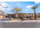 Beautiful single-story home featuring drought tolerant landscaping, and an attached garage at 3120 Greenscape Ln, Las Vegas, NV 89138