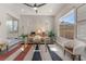Bright office space with modern decor, natural light, and a stylish rug at 3120 Greenscape Ln, Las Vegas, NV 89138