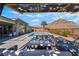 Stunning backyard with pool, spa, and shaded lounge area, perfect for outdoor living at 3120 Greenscape Ln, Las Vegas, NV 89138