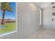 Bright shower features white subway tile and a window with a view of the putting green at 3120 Greenscape Ln, Las Vegas, NV 89138